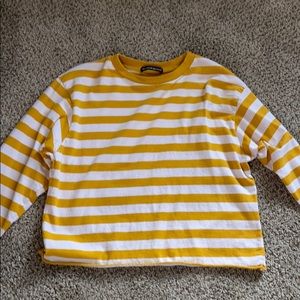 white and yellow stripped crop top